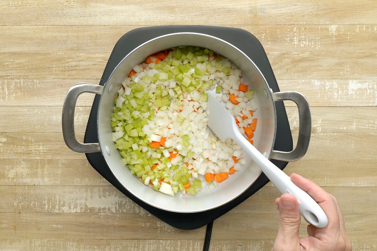 overhead of vegetable being cooked in a pot