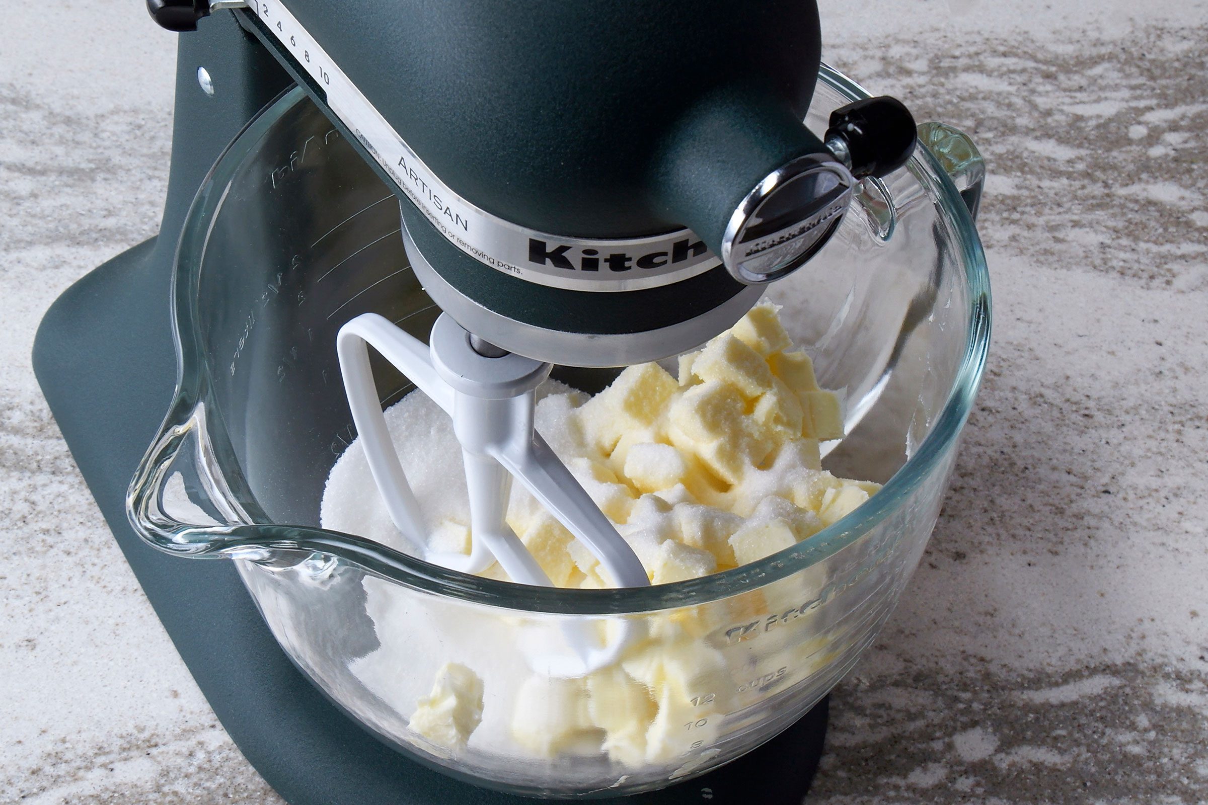 Combined butter, sugar and eggs in a glass bowl