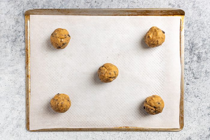 Taste of Home Oreo Cheesecake Cookies photo of the dough balls on a baking sheet.