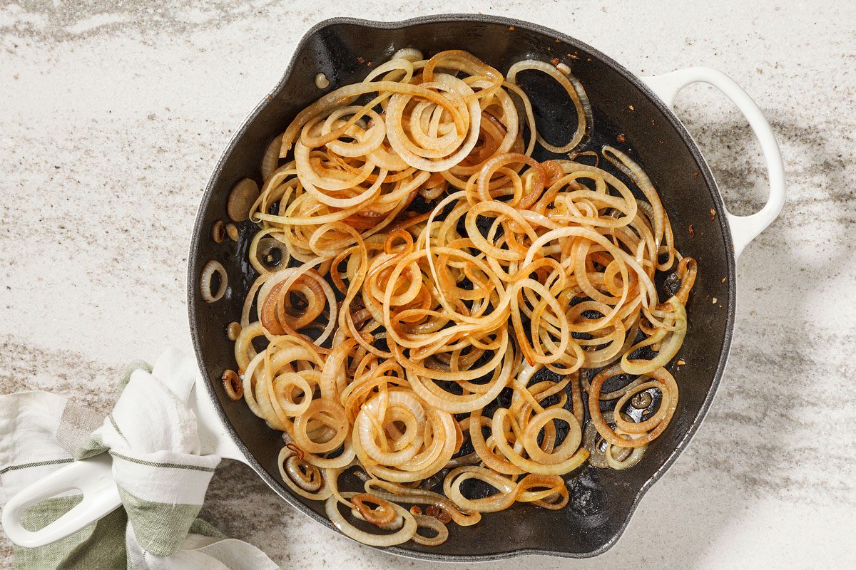 Onions cooking in a skillet