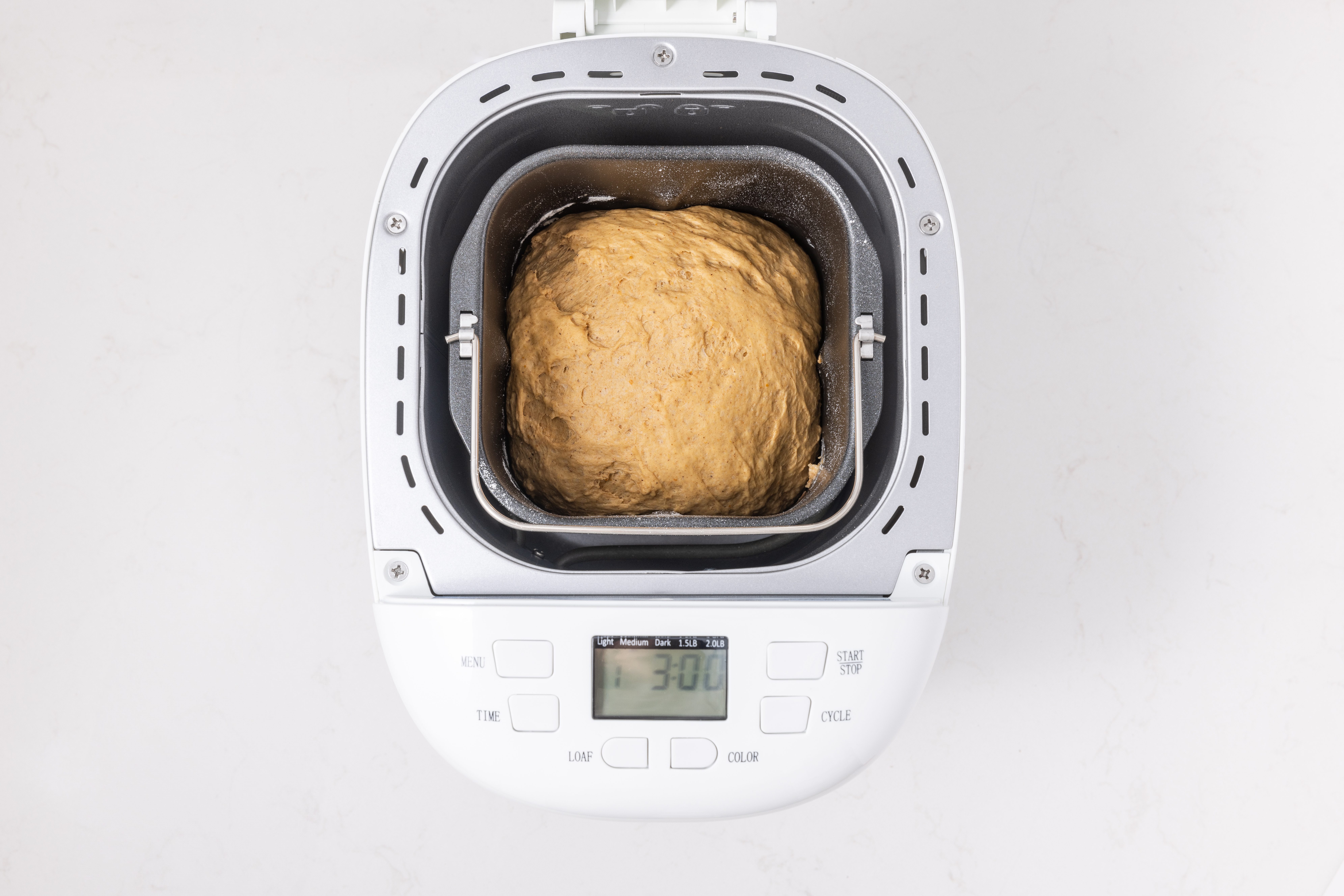 Dough for pumpkin bagels on bread machine.