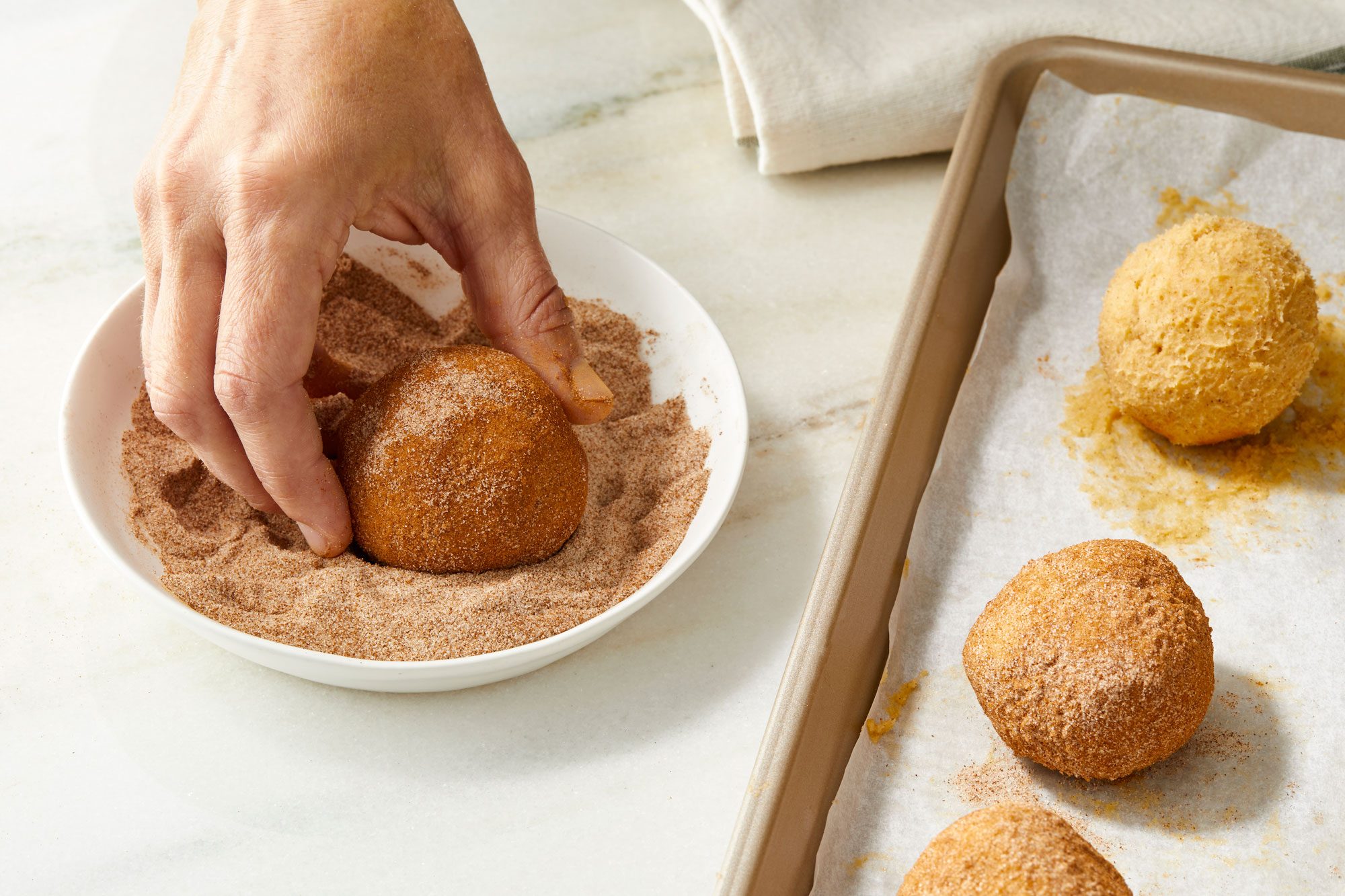 Balls rolled in the cinnamon sugar