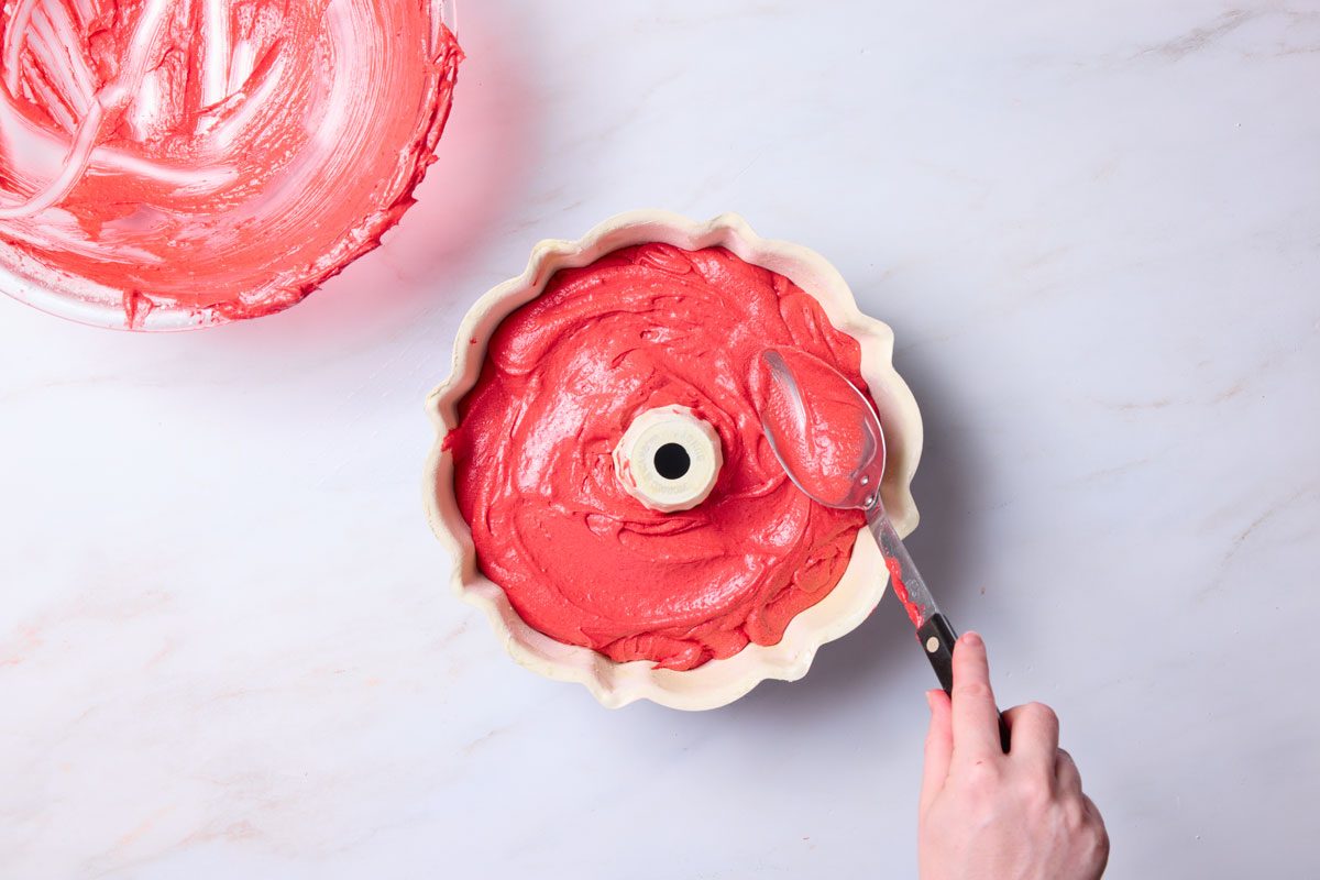 pour batter into greased tin