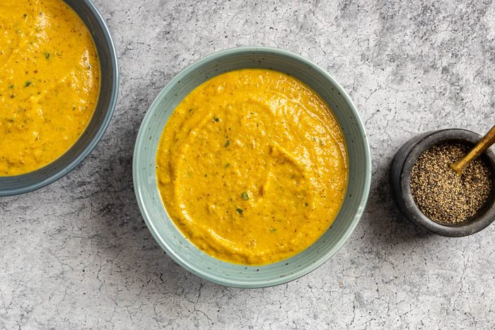 Taste of Home Roasted Cauliflower Soup photo of the soup served with cracked pepper.