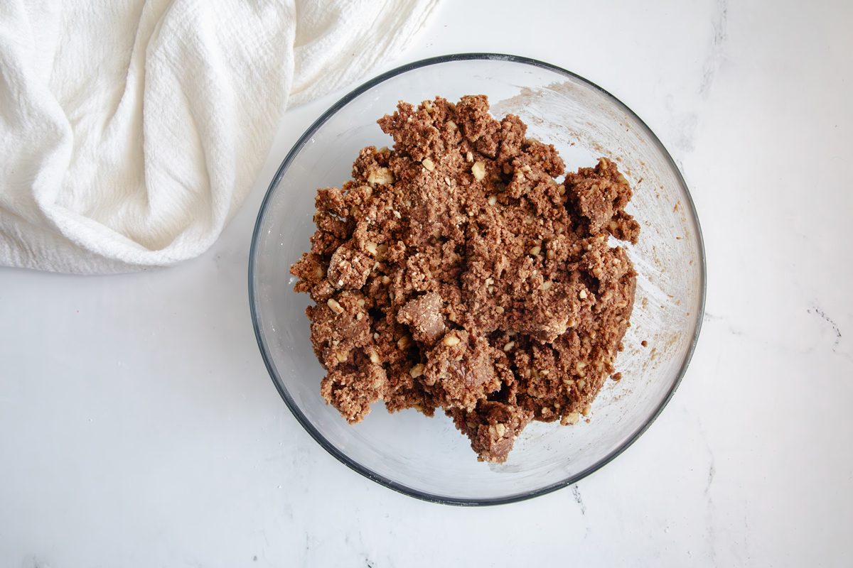 Overhead shot for Taste of Home Rum Balls, all ingredients mixed in a glass bowl.