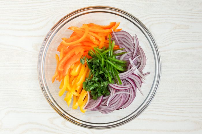 Mixing together Salsa Criolla