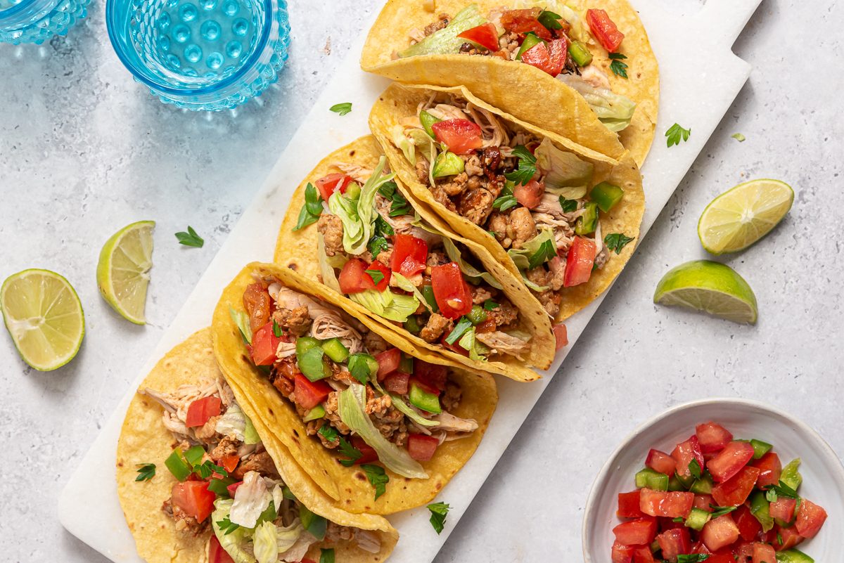 Corn Tortillas With Chicken Tinga, Tomatoes, Lettuce And Lime