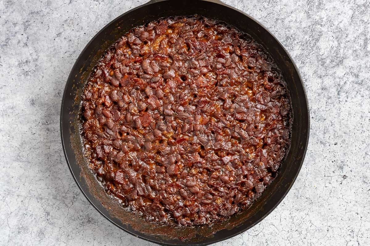 Taste of Home Smoked Baked Beans photo of the smoked baked beans in the skillet.