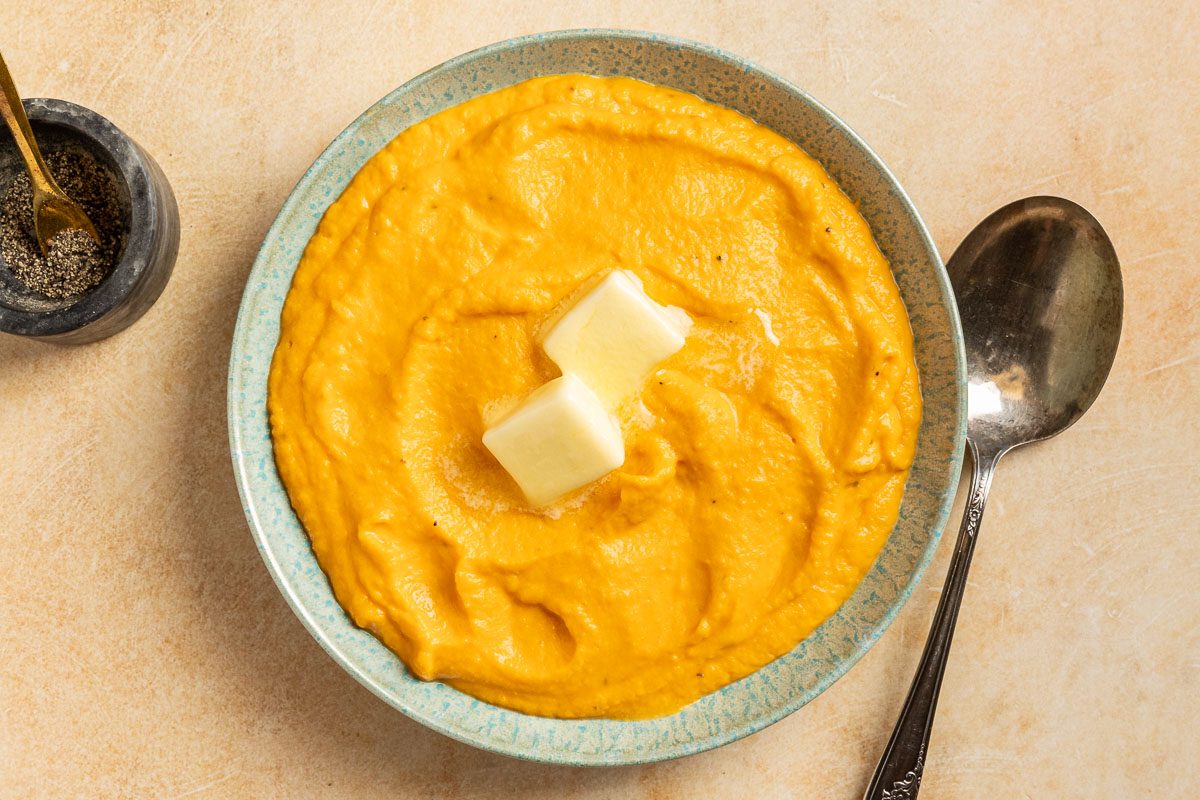 Taste of Home Sweet Potato Puree photo of the finished recipe topped with butter.