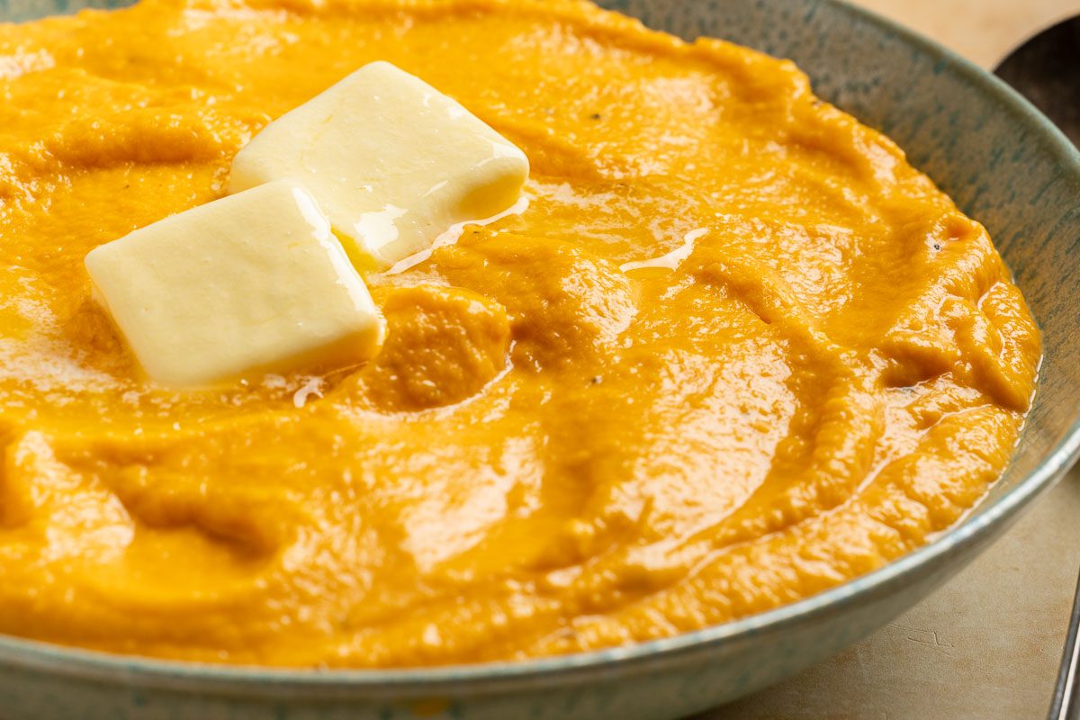 Taste of Home Sweet Potato Puree photo of the finished recipe topped with butter.