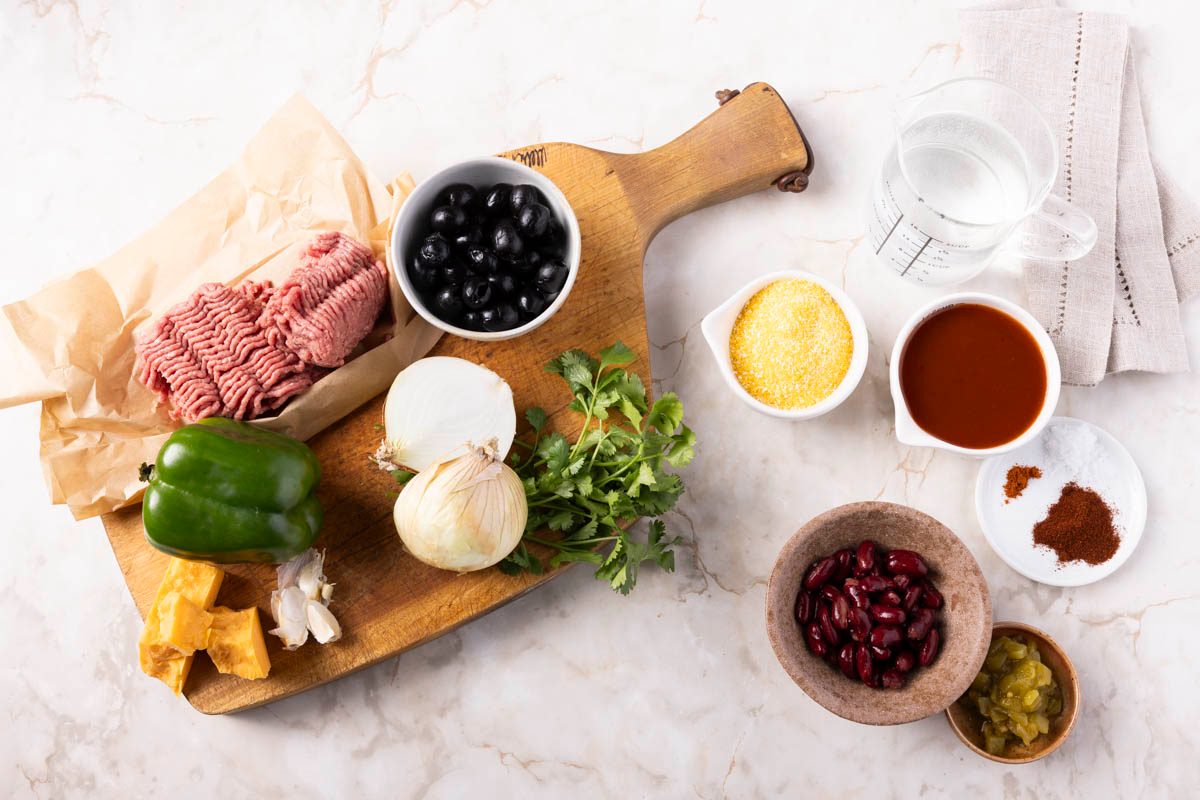 Ingredients for Tamale Casserole shot overhead on marble