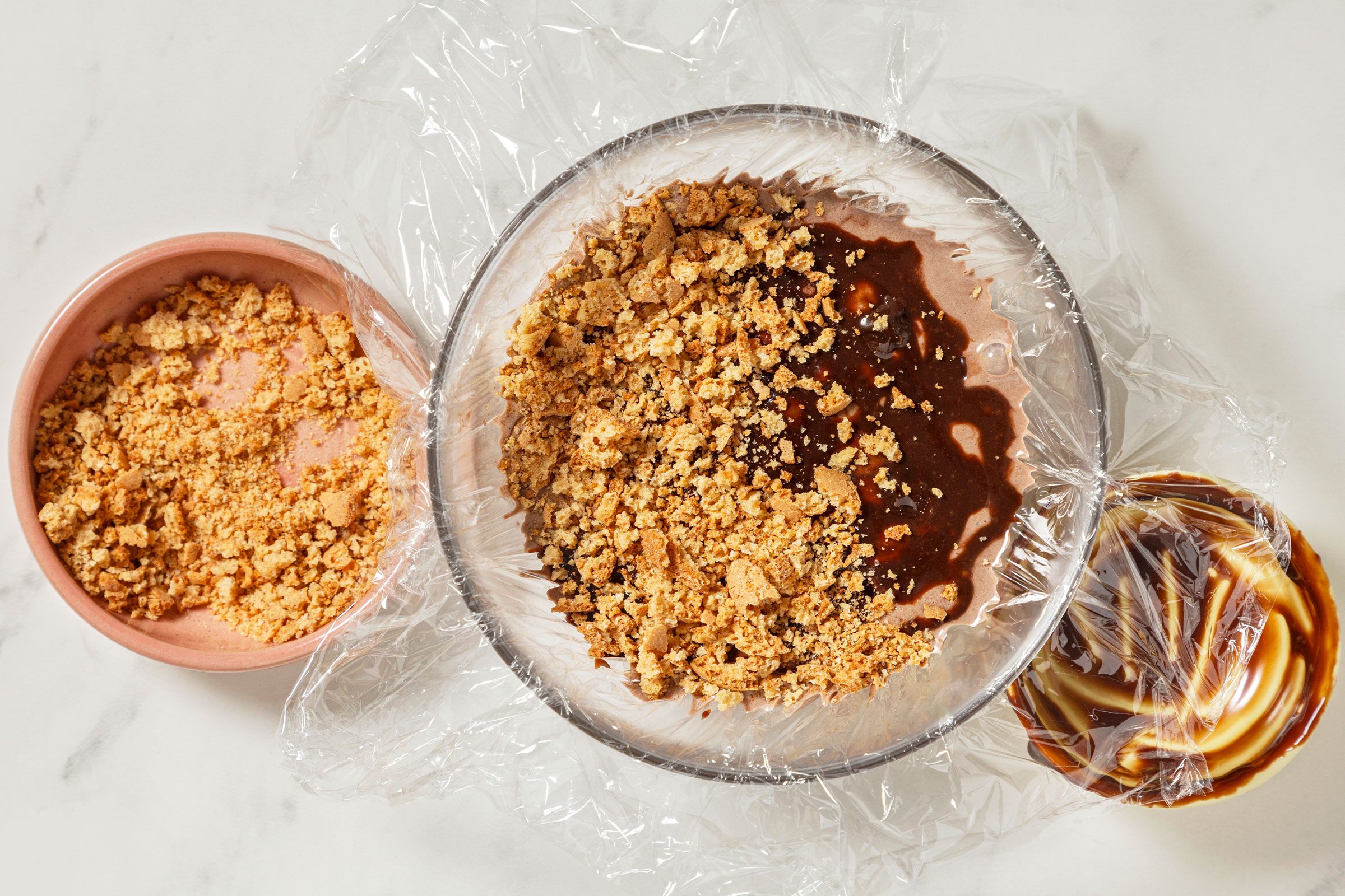 Crushed cookies on chocolate ice cream and fudge