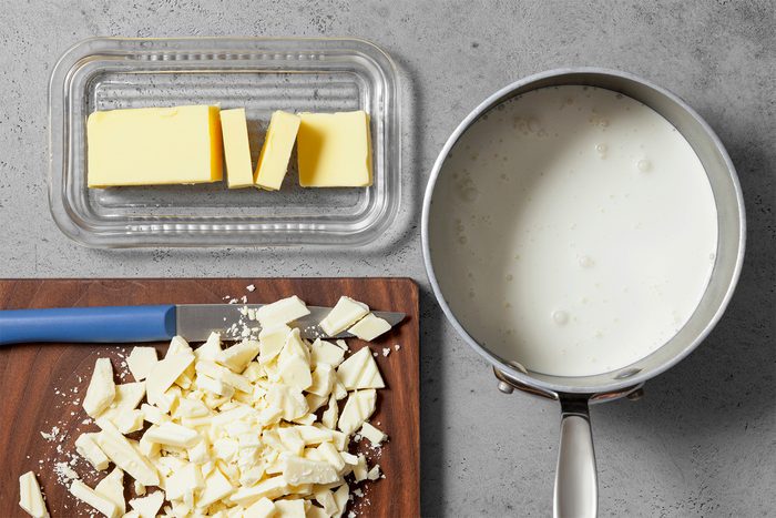 Overhead shot of all ingredients; wooden board; grey surface;