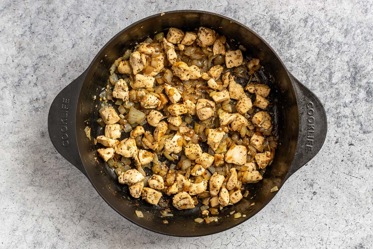 Taste of Home White Lasagna Soup photo of adding the garlic and seasonings.