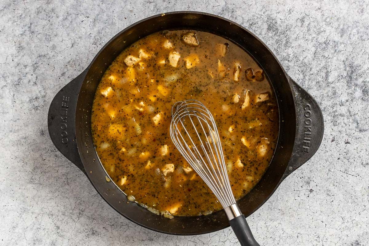 Taste of Home White Lasagna Soup photo of adding the broth and simmering.