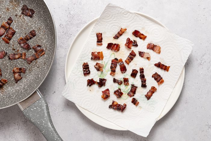 Plate And Pan With Cooked Bacon