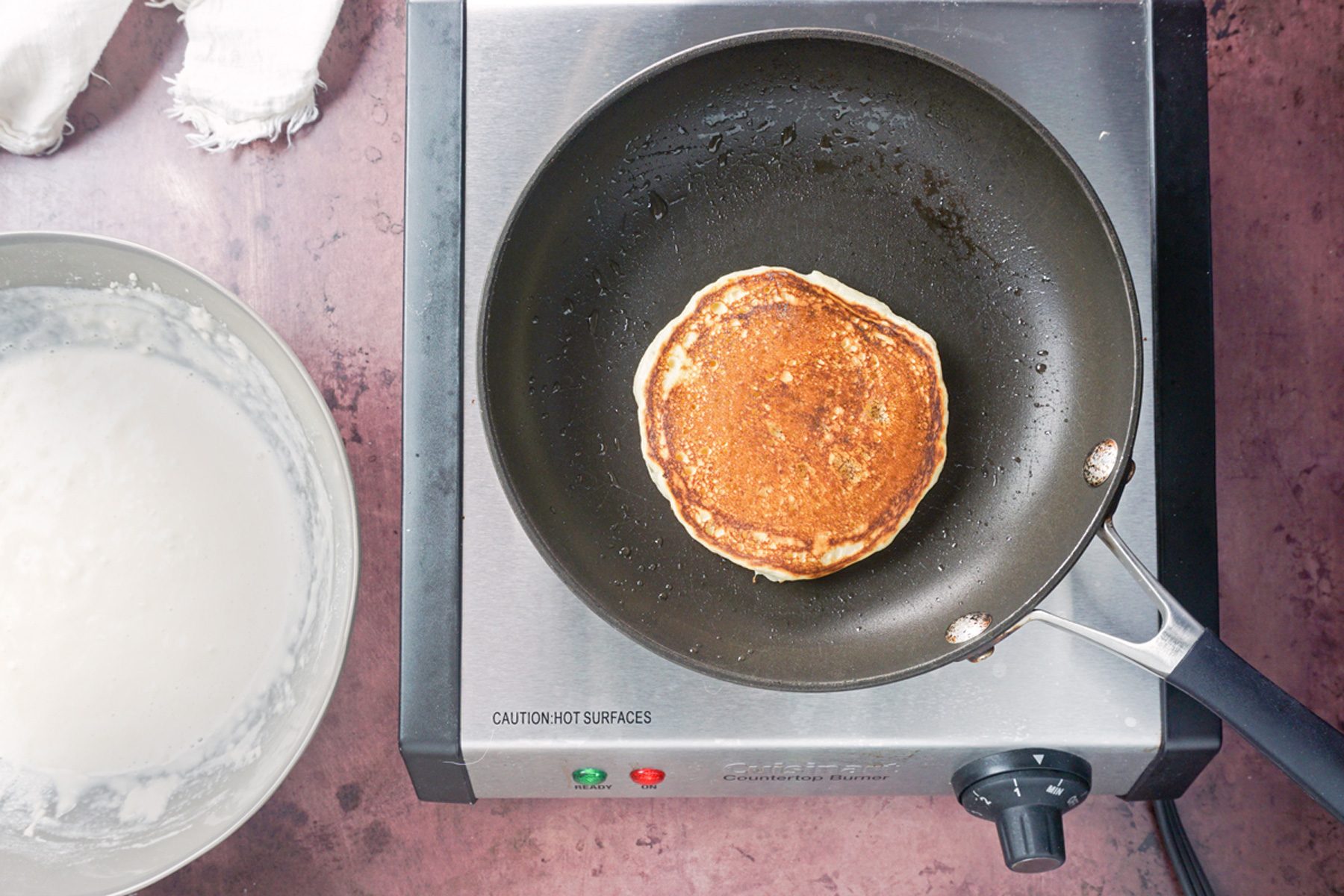 top shot of pancakes being cooked