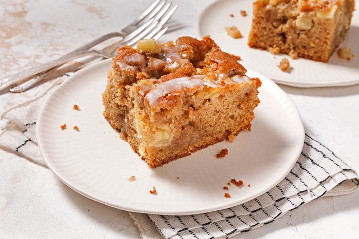 3/4th shot of glazed apple fritter cake slice
