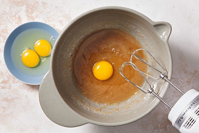 Beat in eggs, one at a time,