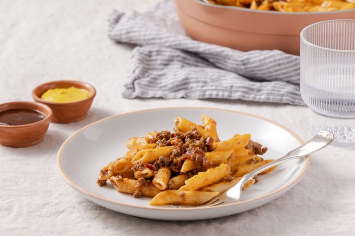 Bacon cheeseburger pasta ready to serve on skillet.