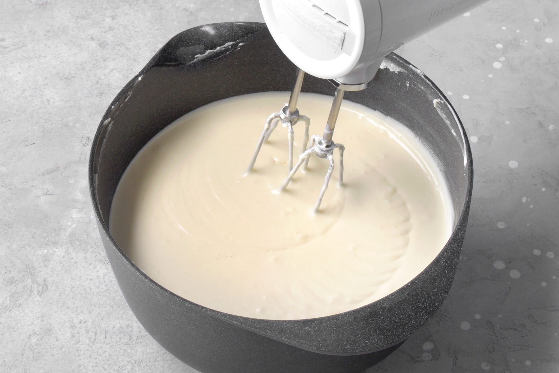 Beat in the heavy cream, flour, vanilla extract, and salt until the mixture is smooth.