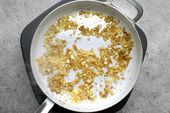 ChatGPT said: ChatGPT Sliced onions are being sautéed in a skillet, becoming golden and translucent as they cook.