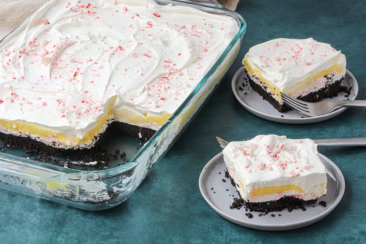 Serving a layered candy cane dessert on small plates.