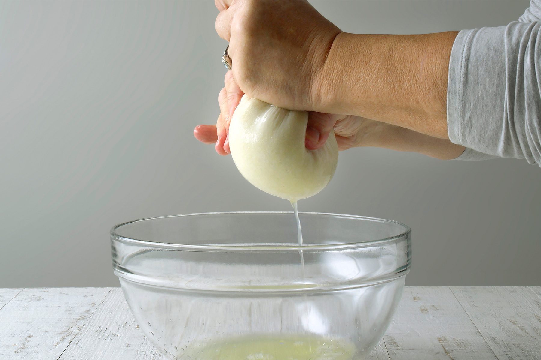 wrap in a clean kitchen towel and squeeze dry.