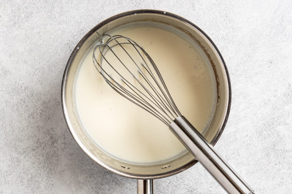 Taste of Home Cheesy Peas photo of creating the sauce.