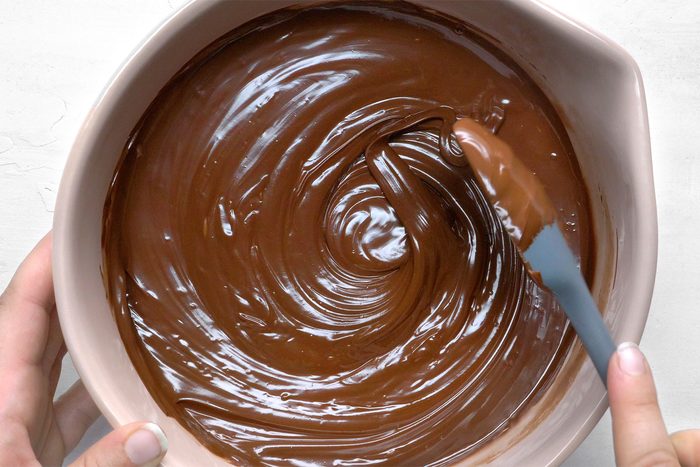 melt chocolate and shortening; stir until smooth