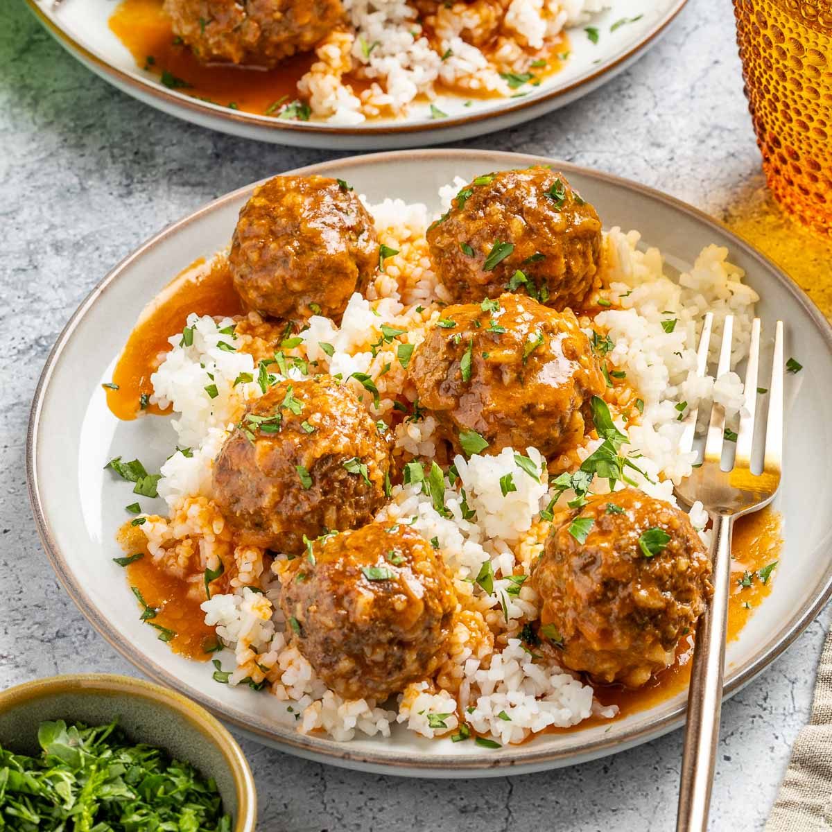 Taste of Home Meatballs and Rice photo of the finished recipe served on plates.