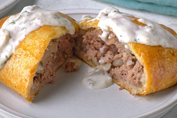 Ground Beef Wellington served on a white plate