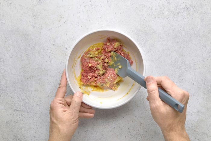 Crumbled beef over egg mixture