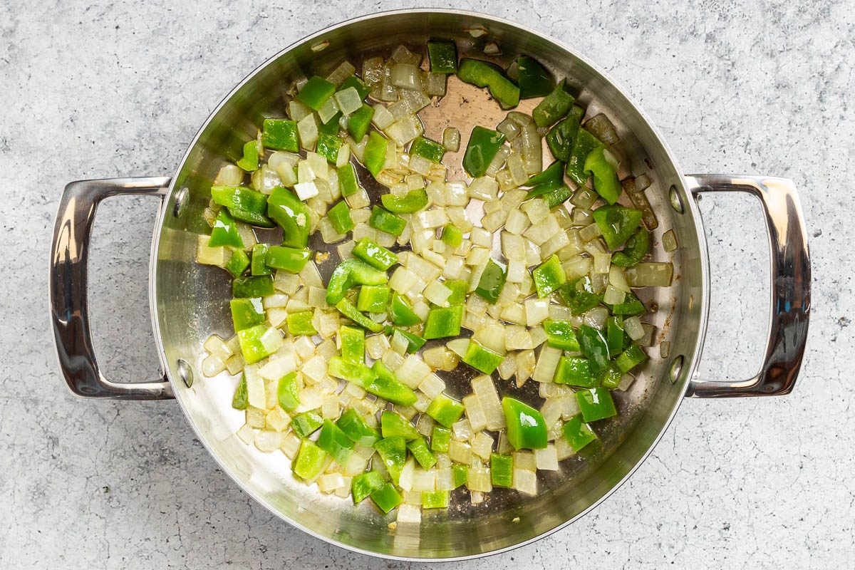 Taste of Home Hominy Recipe photo of the sauteed onion and green pepper.