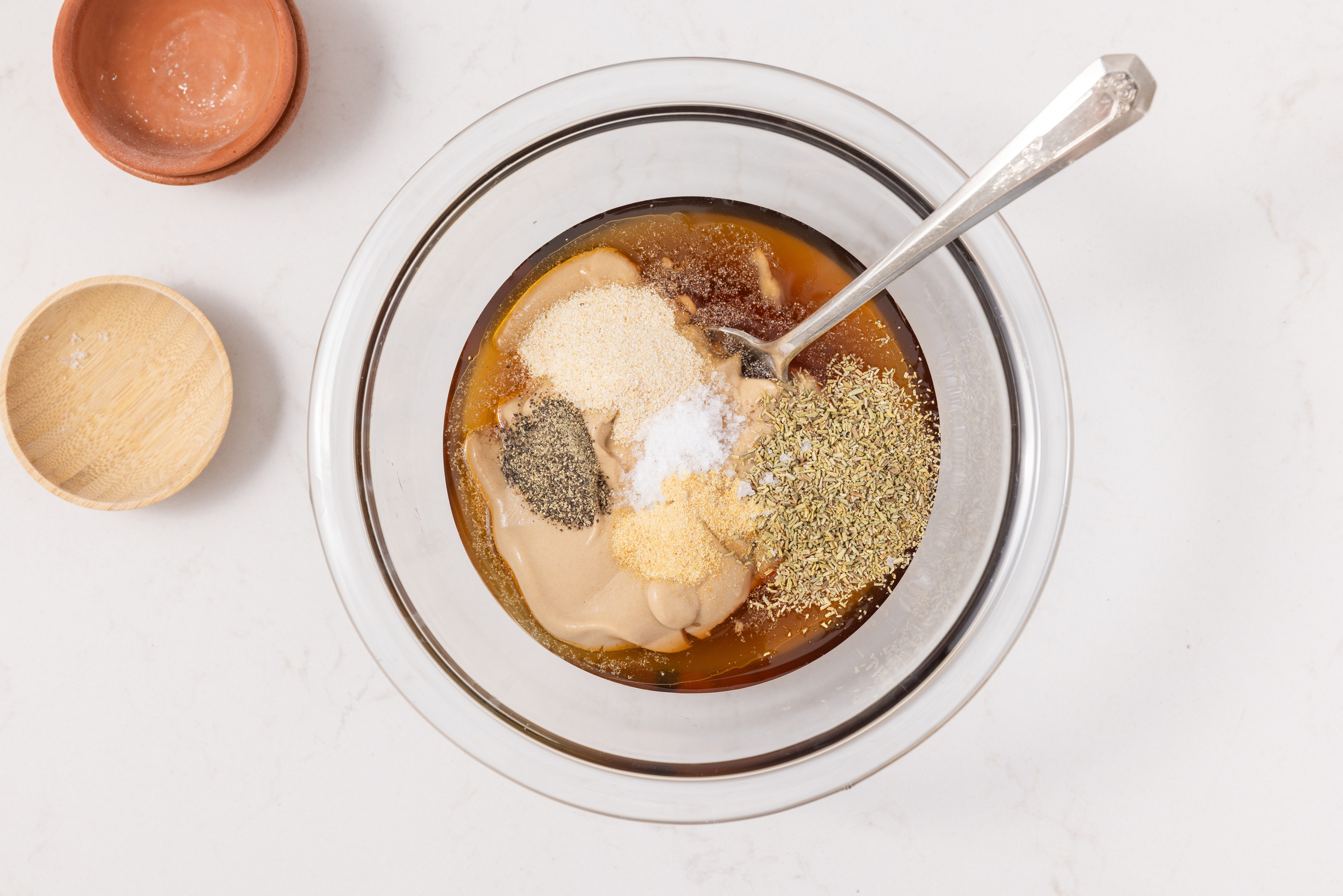 Glaze for honey glazed turkey being prepared in mixing bowl.