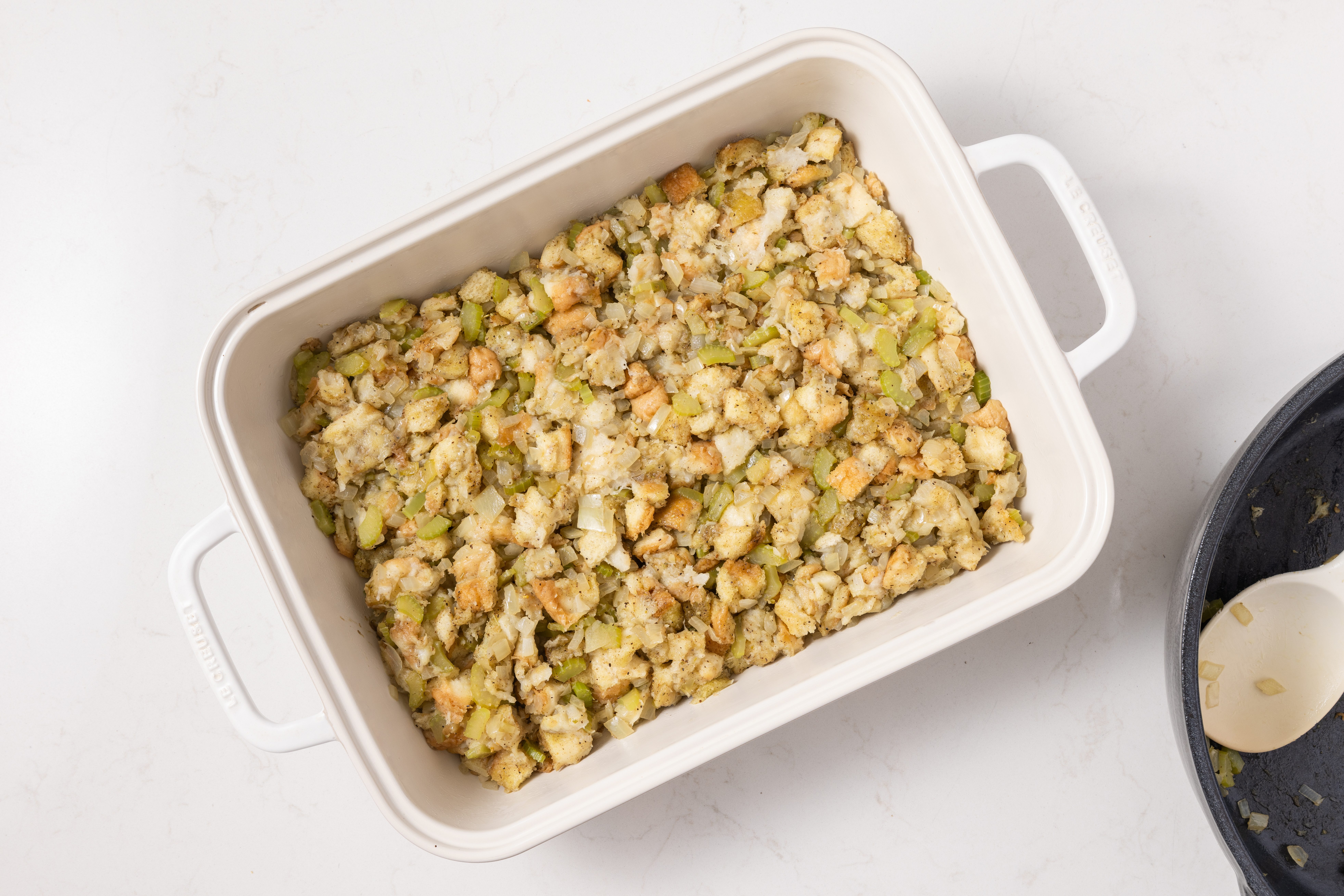 Stuffing ready to go in the oven in baking dish.