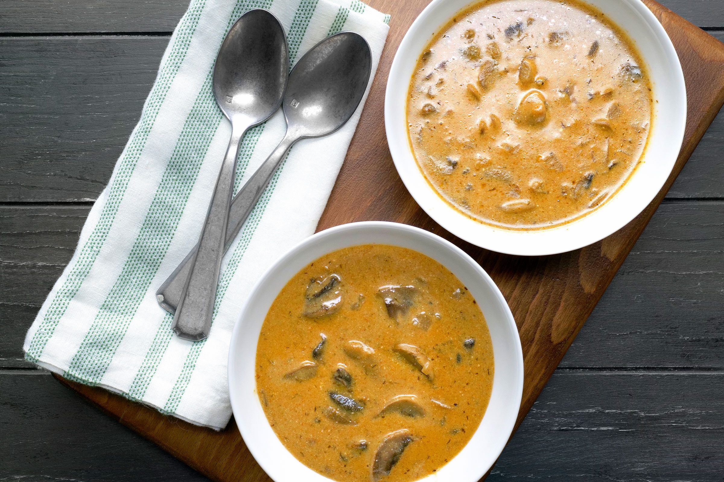 Hungarian Mushroom Soup served in small bowls with spoons on side