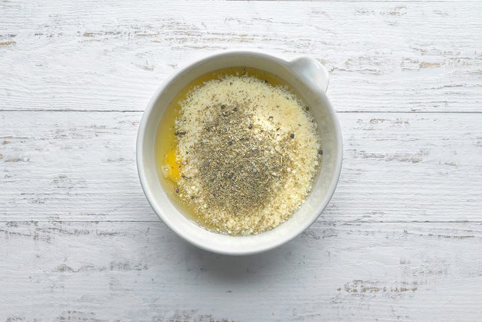 In a large bowl, whisk 6 eggs, Parmesan cheese, Italian seasoning and pepper.