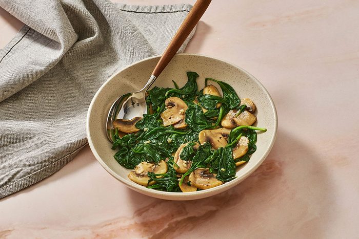 Sautéed mushrooms and spinach in a bowl