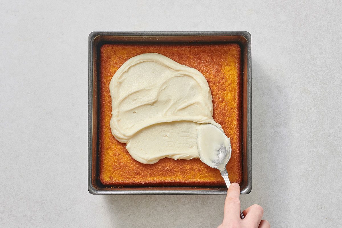 Frosting spread on the cake