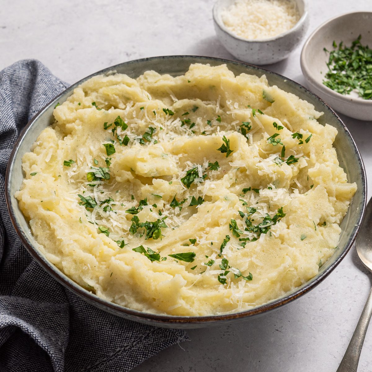 Parmesan Mashed Potatoes In Serving Plate With Parsley