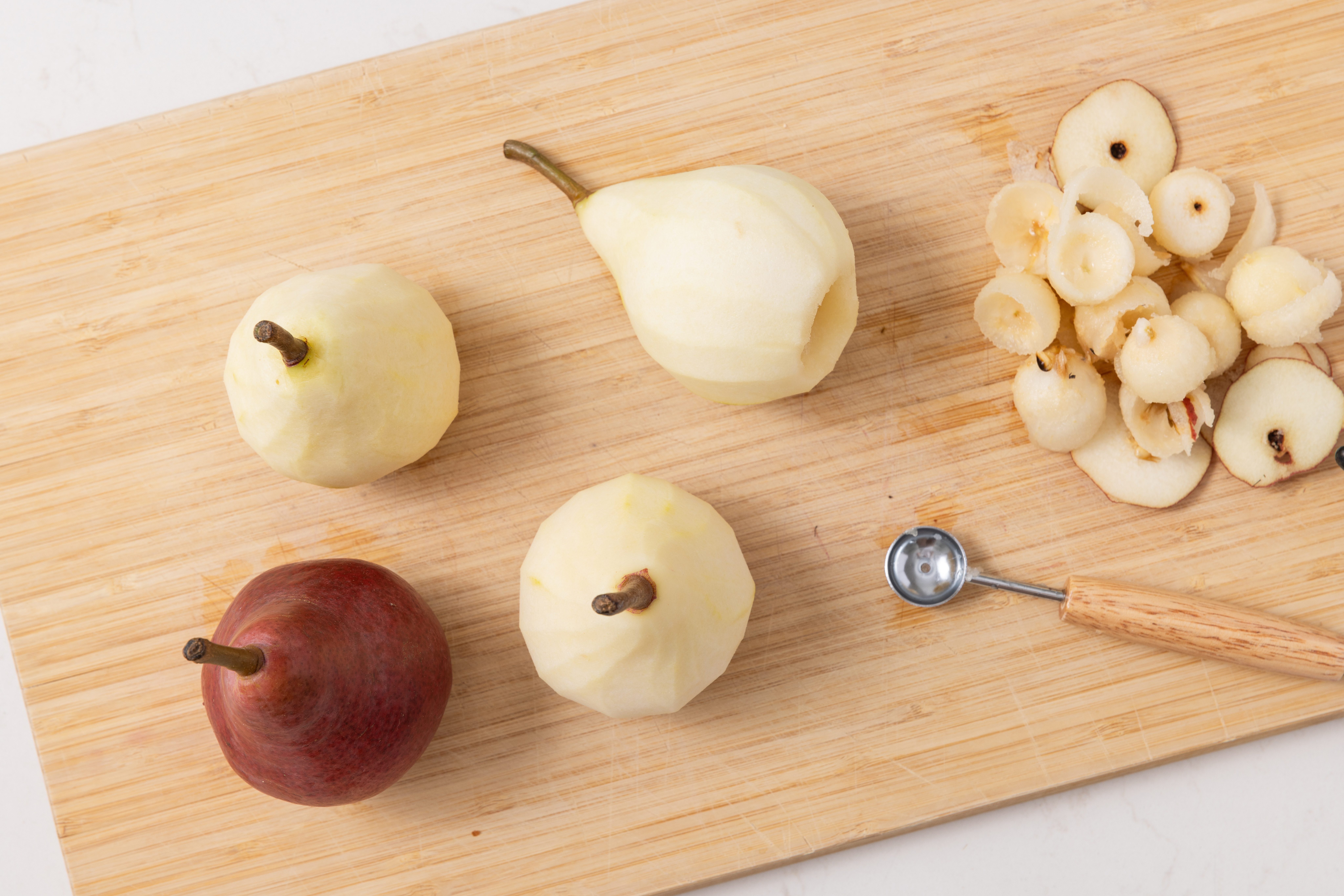 Pears being cored and prepared.