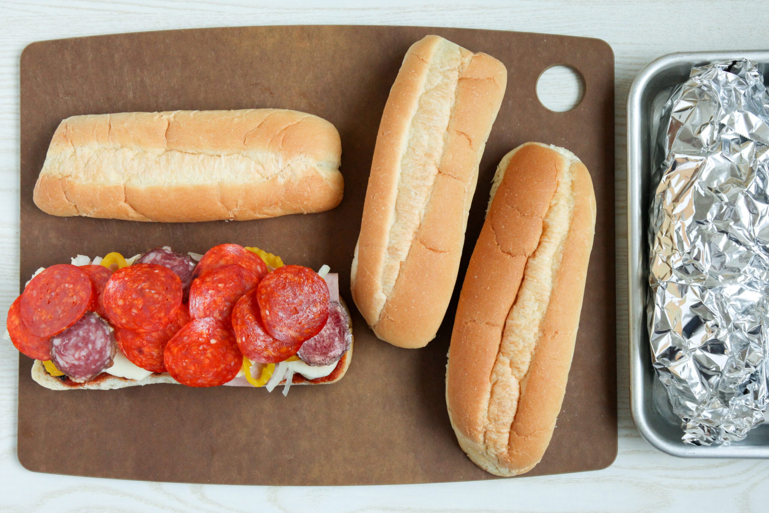 Assembling Pizza Subs