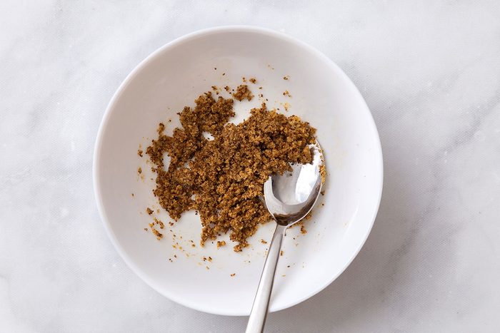 Onion powder, garlic powder, crushed celery seed, Worcestershire sauce, and pepper mixed in a paste for step one of Pork Roast and Sauerkraut recipe for Taste of Home
