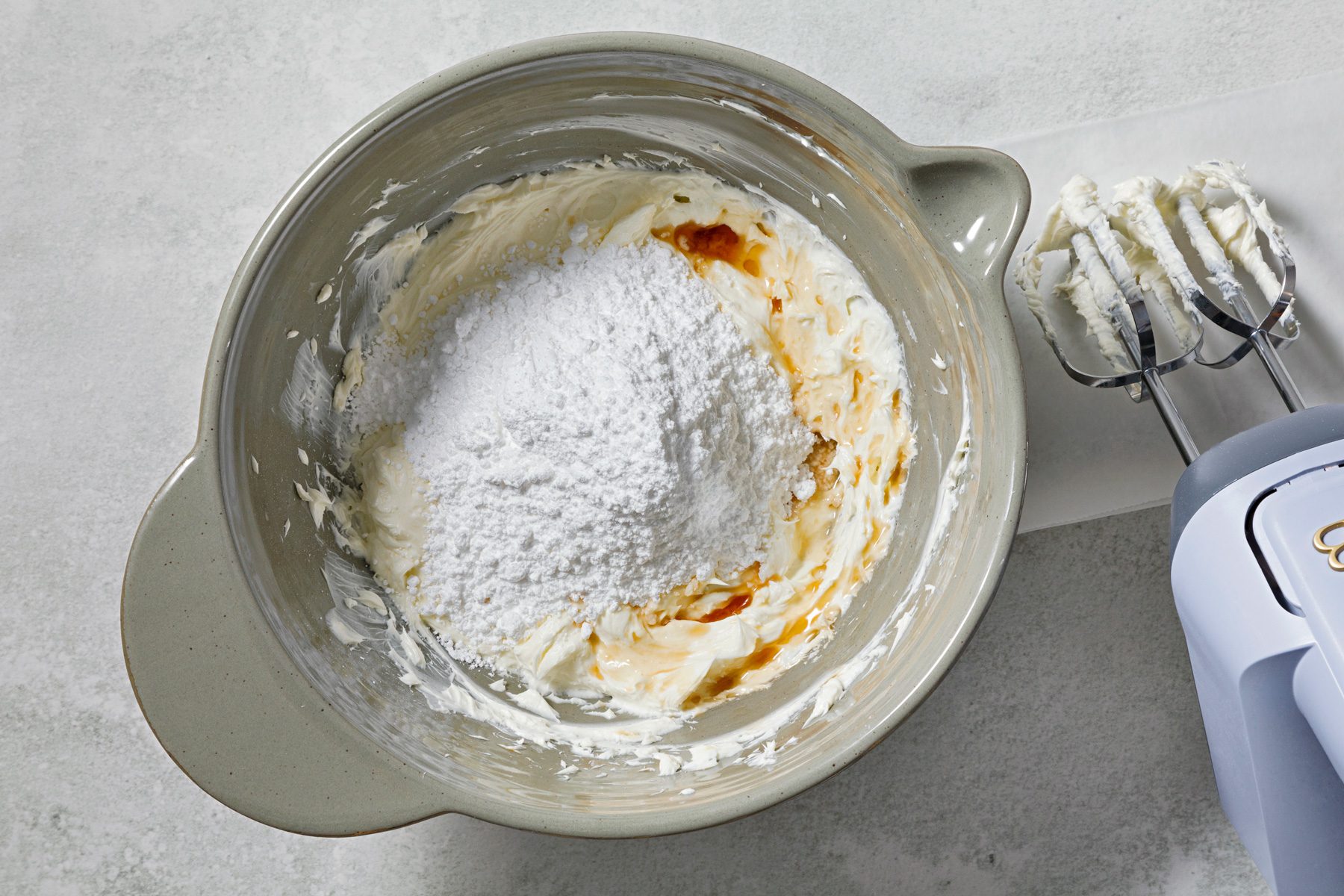 in a large bowl, beat cream cheese and butter on medium speed until smooth.