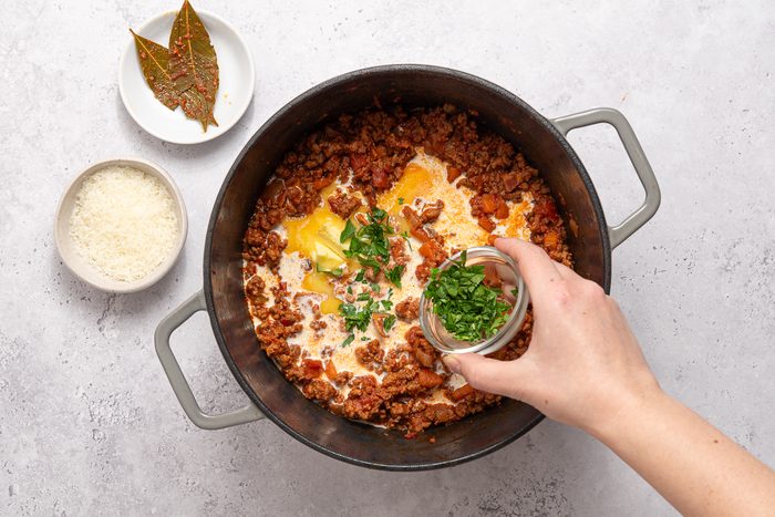 Cream, Butter And Parsley Added To Ragu