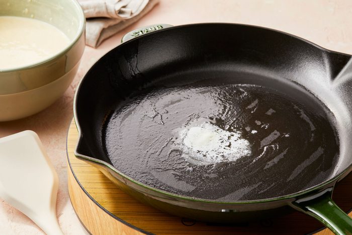 Swirl a small amount of butter in a large skillet over medium-high heat