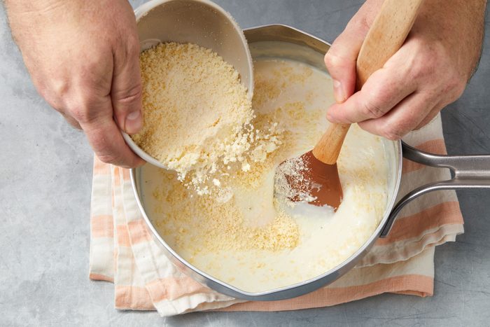 Adding parmesan cheese in thick pasta sauce
