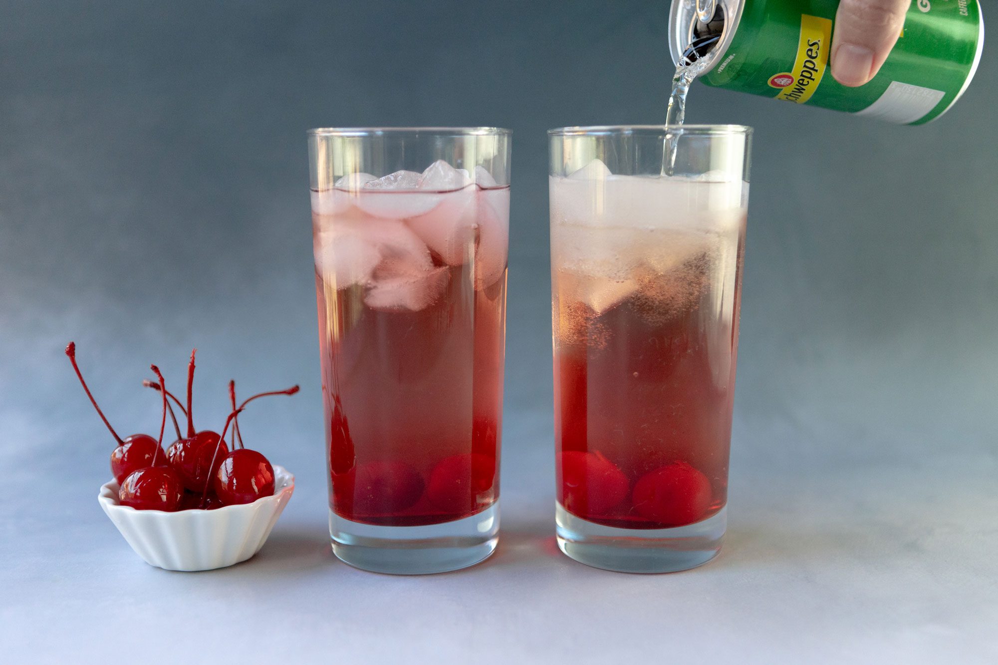 Slowly pour 8 ounces of cold ginger ale over the ice
