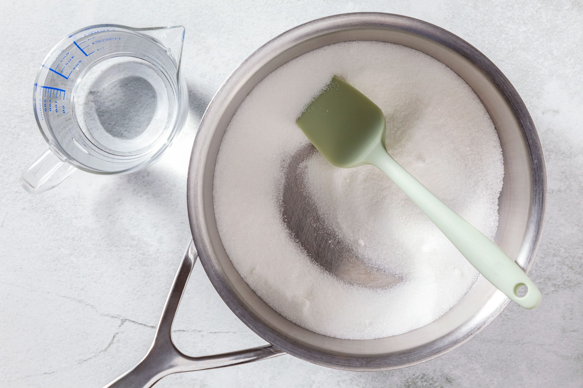 combine water and sugar in a saucepan